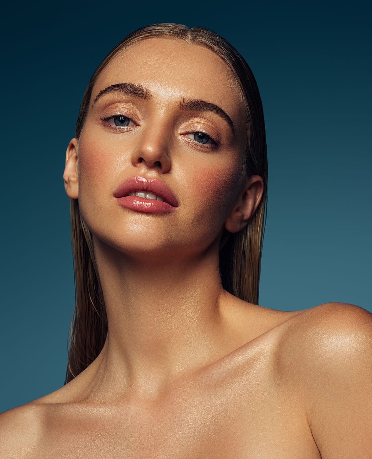 Model with radiant skin and soft features.